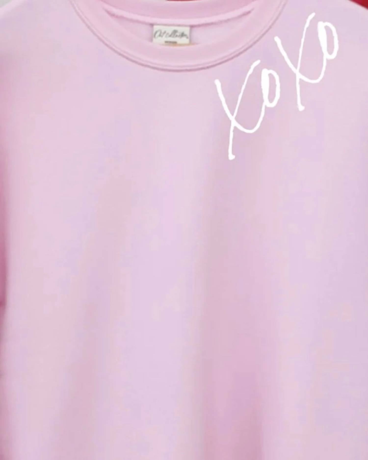 Oat Collective XOXO Graphic Sweatshirt in pink - women's top - detail view