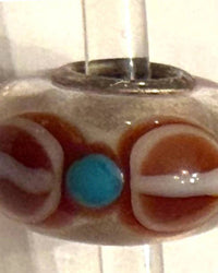 Trollbeads Women's Universal Charm Bead in unique brown white blue dots - women's item - detail view