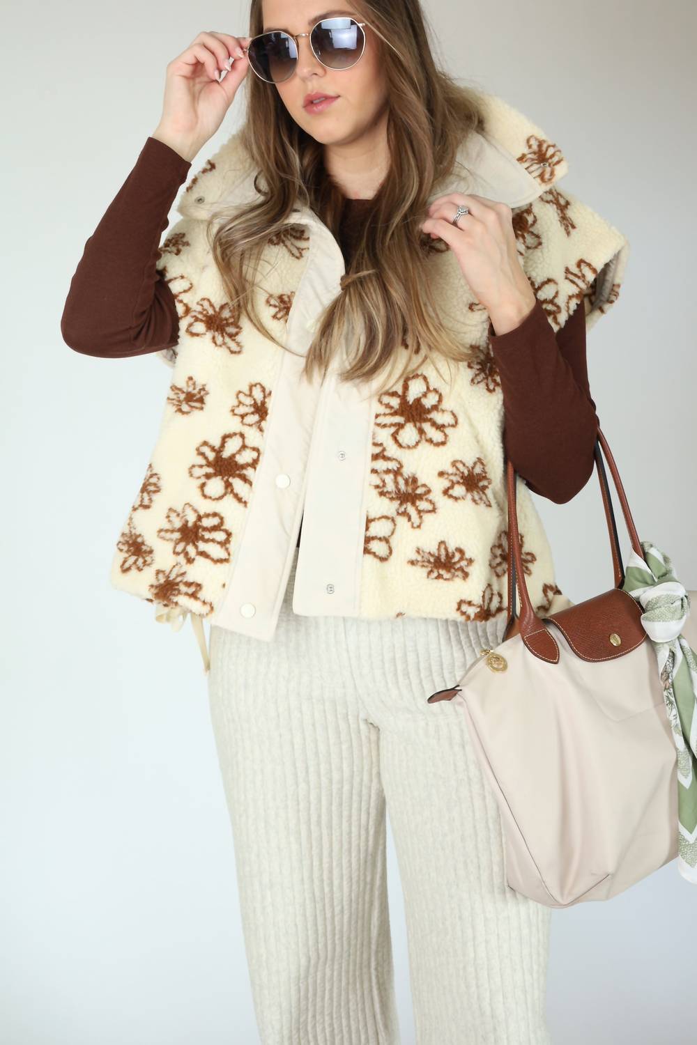 So Me Shaylie Floral Sherpa Vest in beige - women's jacket