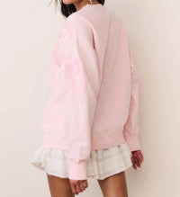 LoveShackFancy Palo Sequin Bow Fleece Pullover Sweatshirt in wistful pink - women's top - detail view