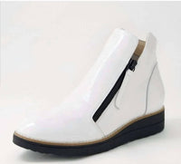 Django & Juliette Women's Ohmy Leather Sneaker in white black sole patent leather - women's sneaker - detail view