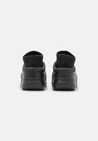 Ugg - Women's Tasman X Shoes