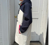 NIKKI JONES Long Lightweight Raincoat With Hood in navy and pink - women's jacket - detail view