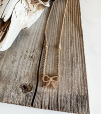 Boho Ranch Women's Dainty Crystal Bow Layering Necklace in gold - women's jewelry - detail view