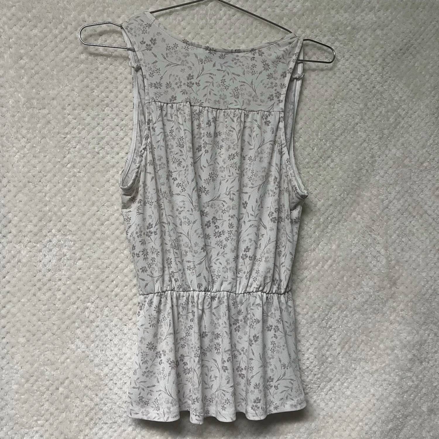 GILLI Women's V Neck Sleeveless Surplice Peplum Top in ivory multi - women's tank top - detail view