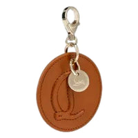 Christian Louboutin Women's Round Leather Logo Bag Charm Keychain in brown - women's item - alternate view