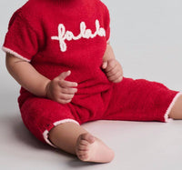 BAREFOOT DREAMS Baby Fa La La Onesie in holly red - kids' item