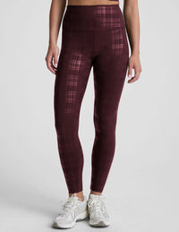 BEYOND YOGA High Waisted Midi Legging in plaid foil burgundy - women's pants