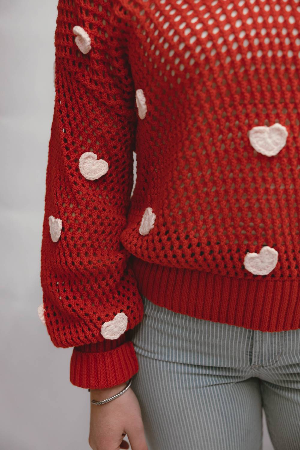 Aaron & Amber Crochet Heart Embellishment Sweater in red - women's sweater - detail view