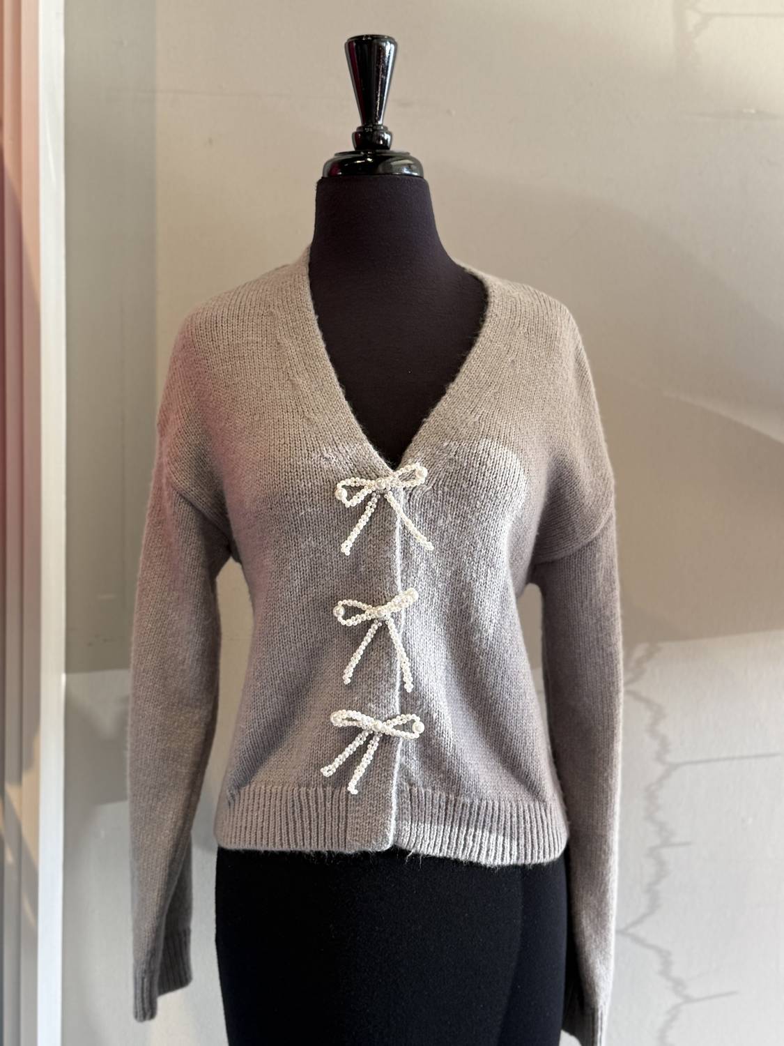 Design History - Pearl Bow Cardigan