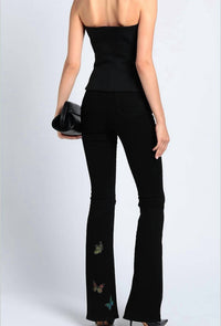 Amiri Women's Butterfly Flare Broken Jeans in black - women's pants - detail view