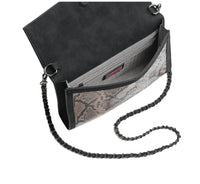 HAUTE SHORE Women's Beth Python Clutch Bag in brown python - women's bag - alternate view