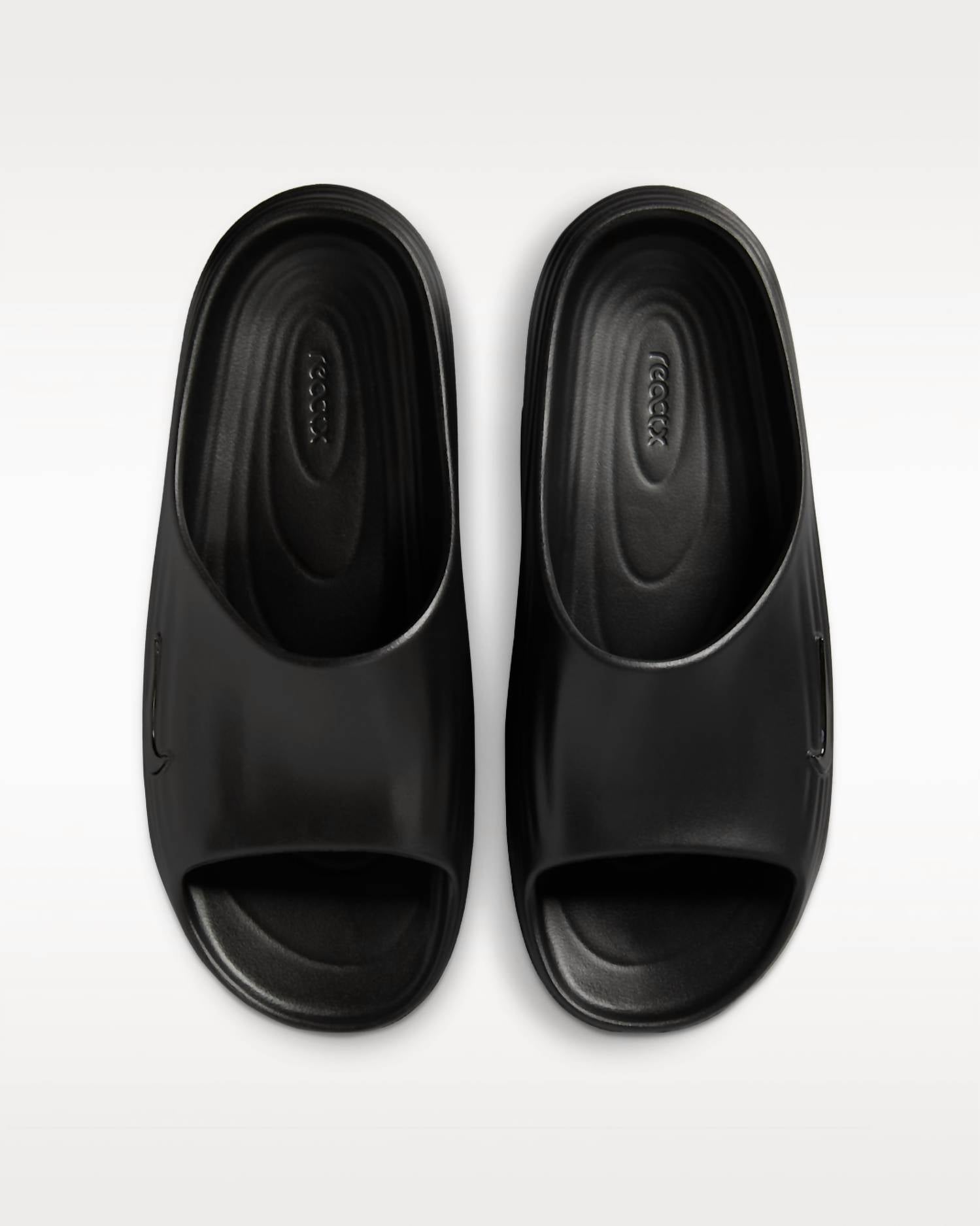 NIKE Men's Reactx Rejuven8 Slide Sandals in black black black - men's sandal - detail view