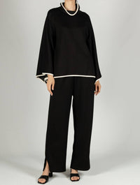 P.CILL Evelyn Cowl Neck Poncho Top in black - women's sweater