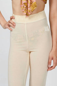 SMOCKED FLARE PANTS