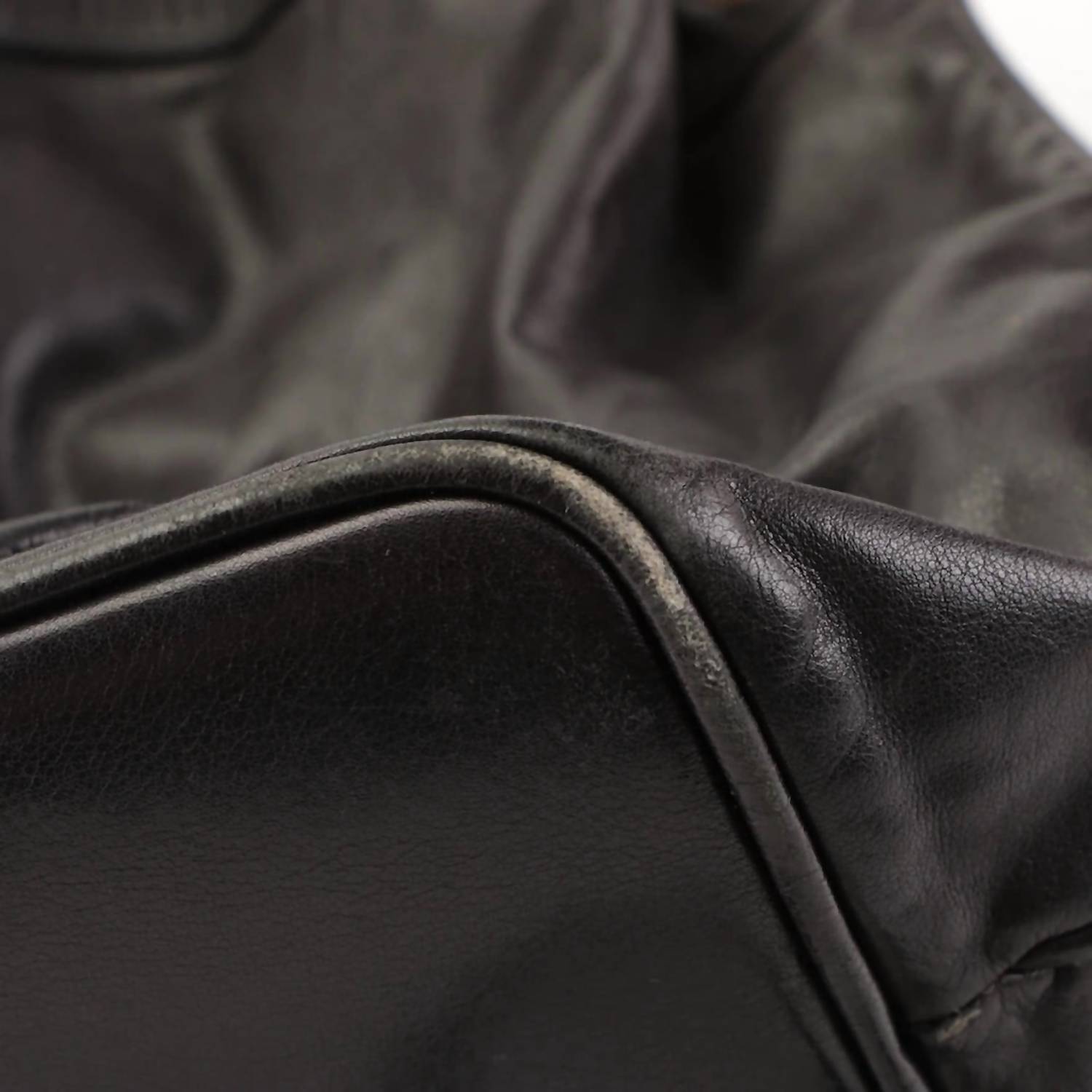Chanel - Drawstring Sling Backpack