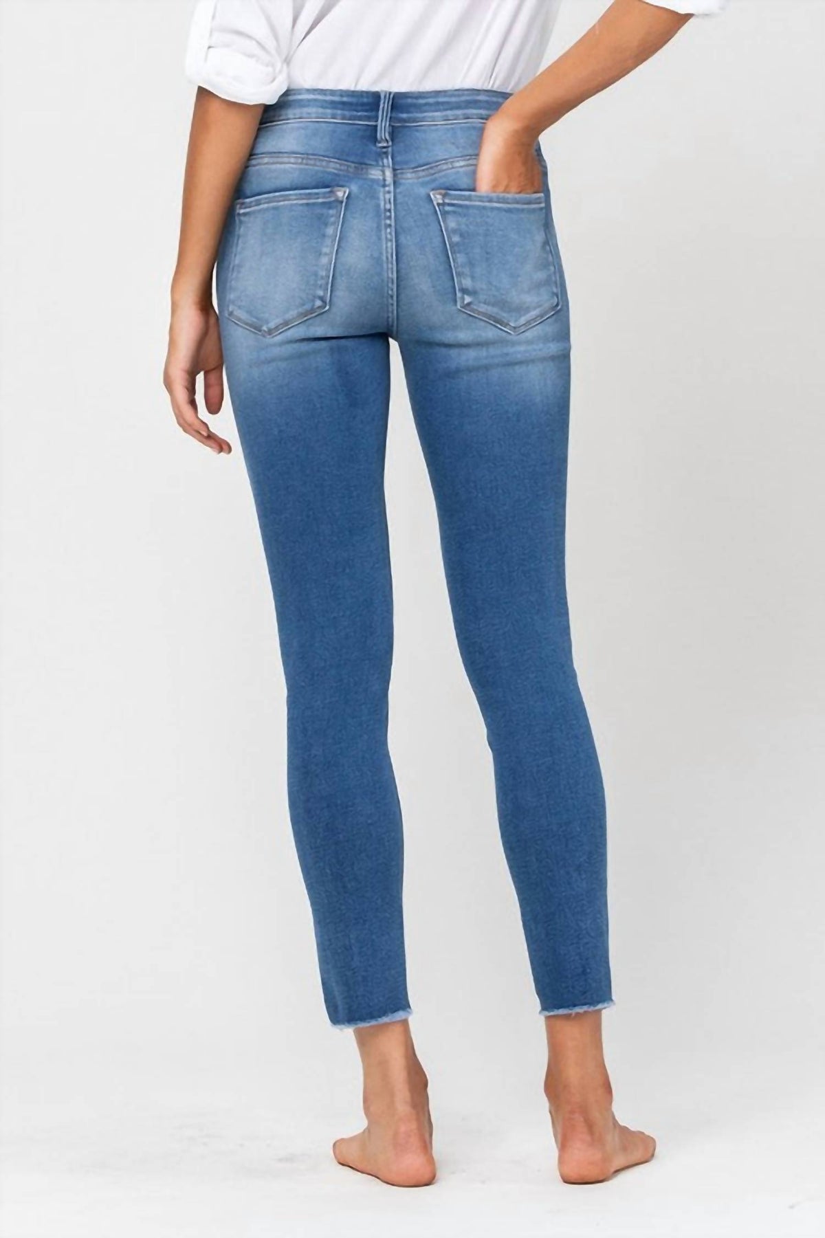 Simon Mid Rise Raw Hem Skinny Jean