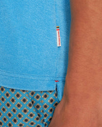 Orlebar Brown Terry Towelling Polo Shirt in aqua blue - men's shirt - detail view