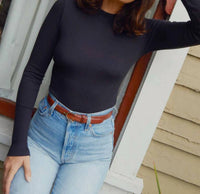 Nation LTD Gina Slim Mock Neck Top in jet black - women's long sleeve top - detail view