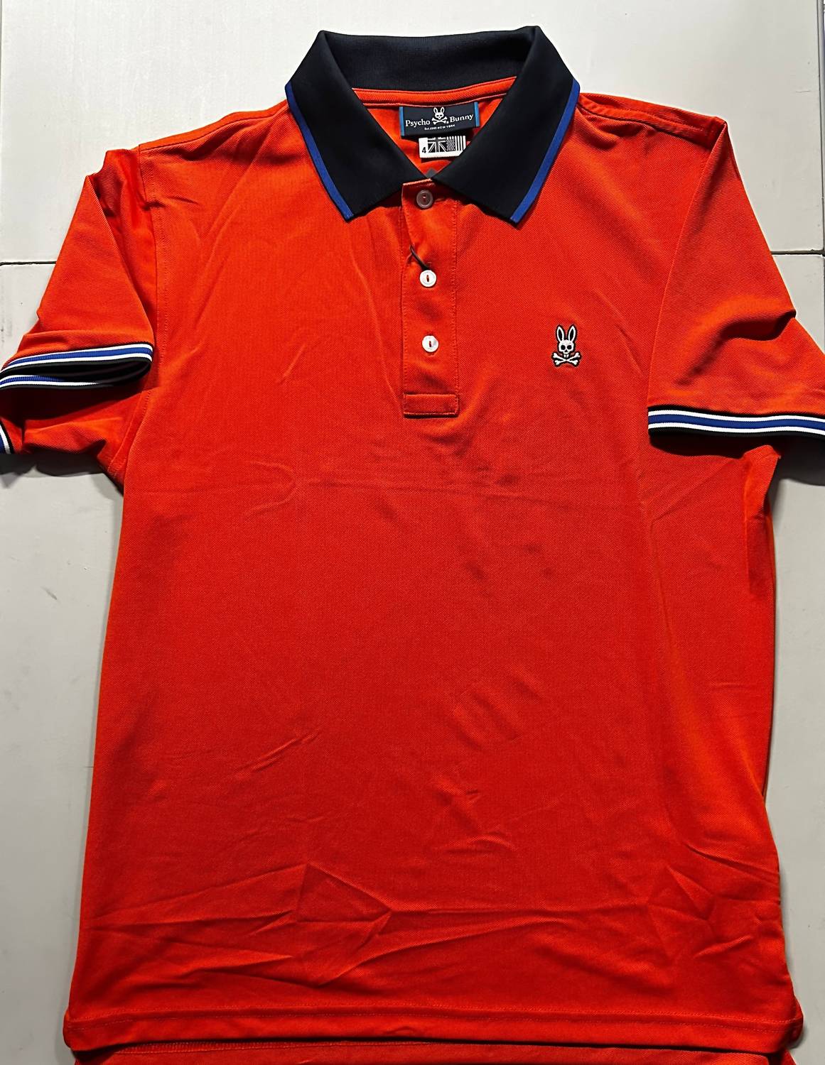 Psycho Bunny Men's Isaac Polo in orange - men's shirt
