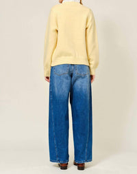 Aaron & Amber Ruffle Trim Long Sleeve Cardigan in yellow - women's cardigan - detail view