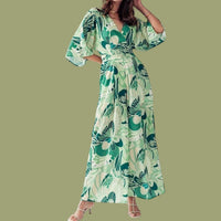 Big Hit Fashion - Elsie Open Back V-neck Tie Floral Jumpsuit