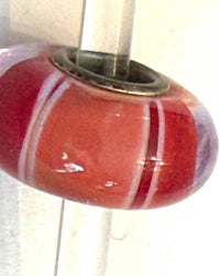 Trollbeads Women's Universal Charm Bead in unique red peach stripe - women's item - detail view
