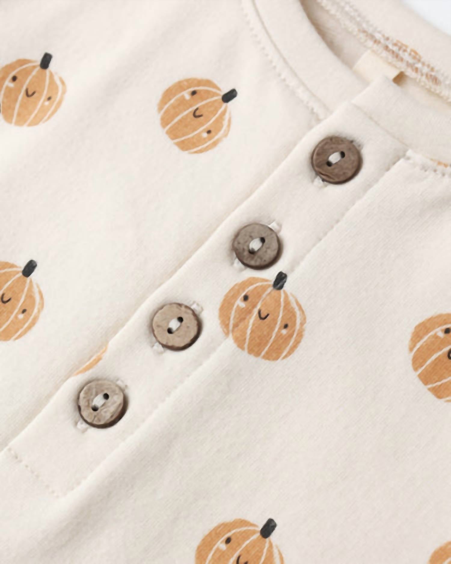 Quincy Mae Kid's Relaxed Fleece Jumpsuit in smiley pumpkins - kids' item - alternate view