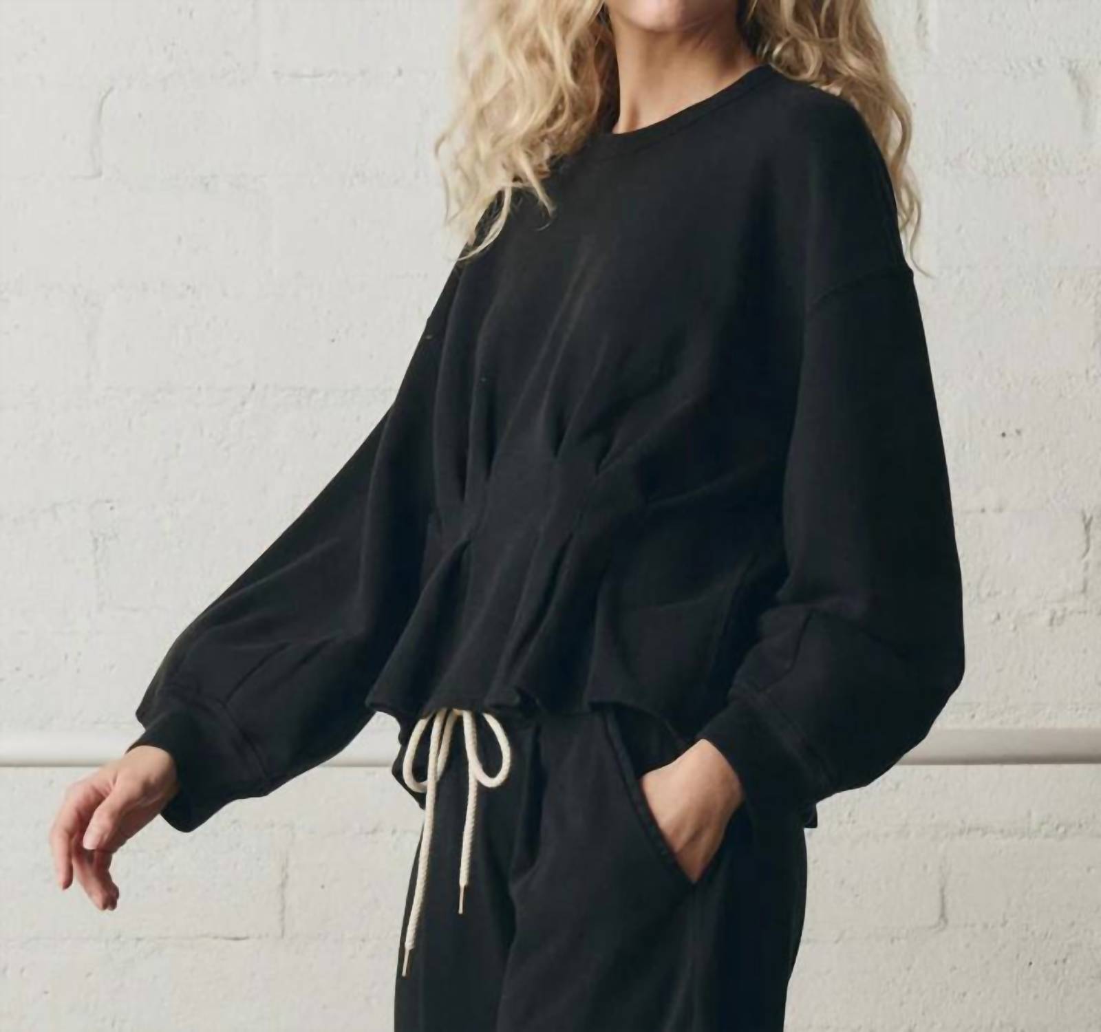 THE GREAT. The Slouchy Corset Sweatshirt in true black - women's top - alternate view