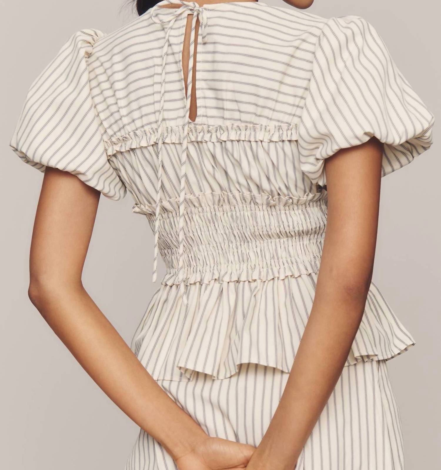 En Saison Azra Puff-sleeve Peplum Top in ivory - women's t-shirt - detail view