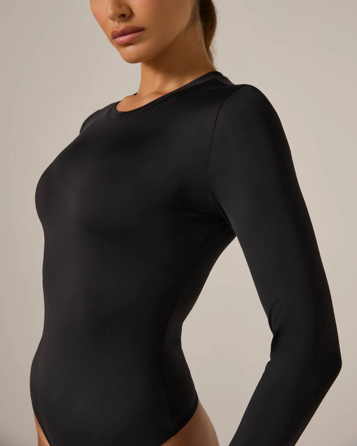 7Diamonds Sleek Long Sleeve Bodysuit in black - women's shirt - alternate view