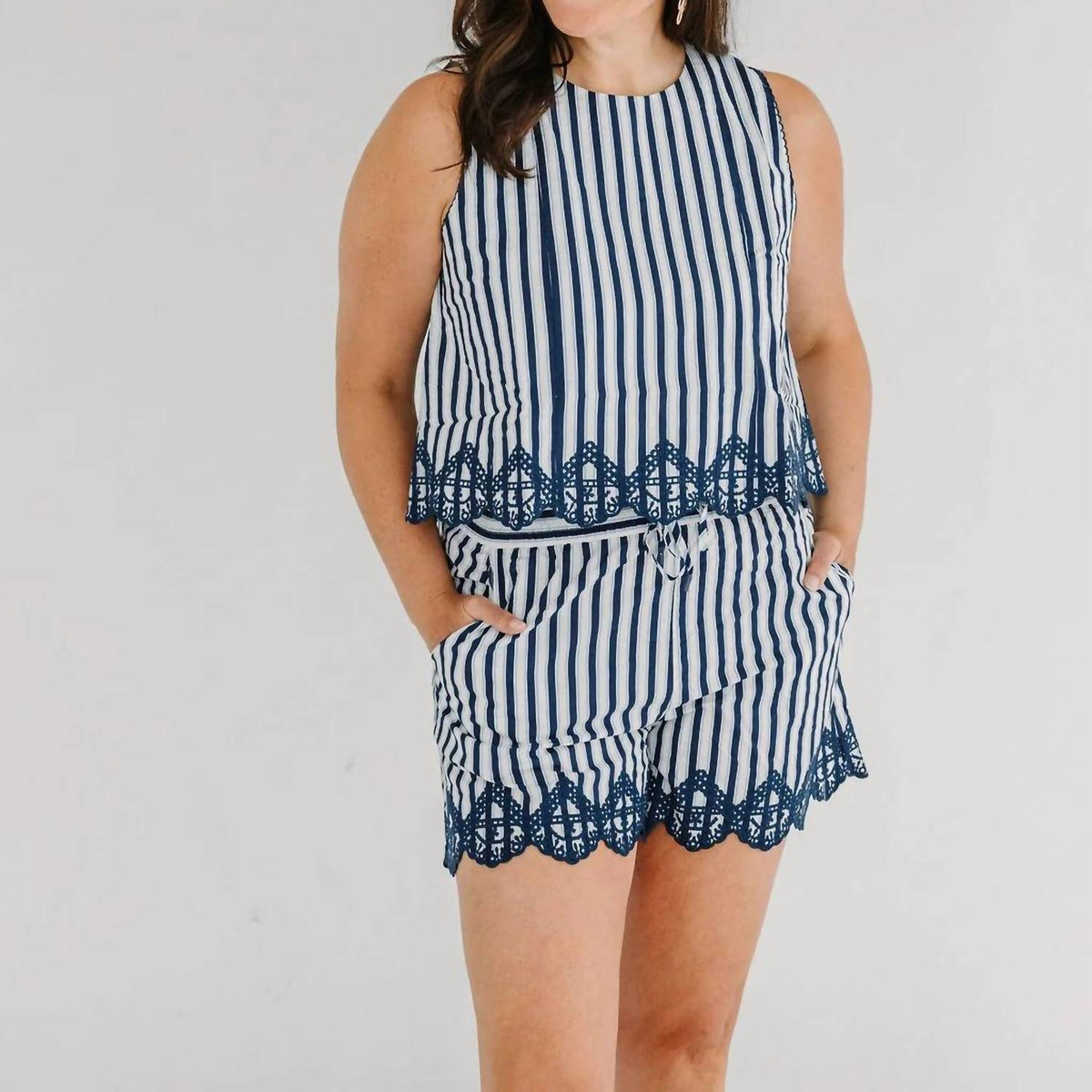Skies Are Blue - Sleeveless Striped Top With Embroidery Hem