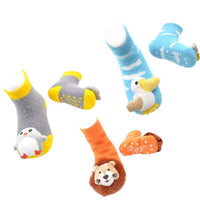 Liventi Inc. Kids Boogie Toe Rattle Socks - Set Of 3 in baby lion penguin baby pelican - kids' accessory - detail view