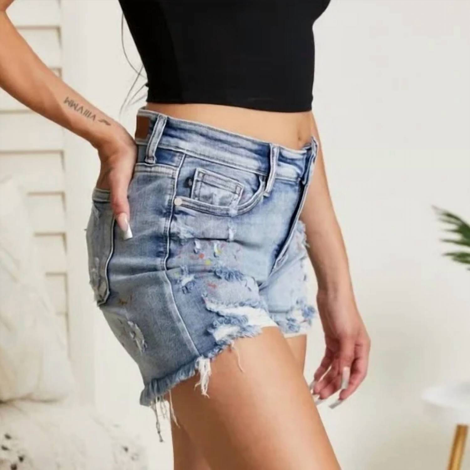 Judy Blue Mid-rise Rainbow Paint Splash Cut Off Shorts in blue - women's shorts - detail view