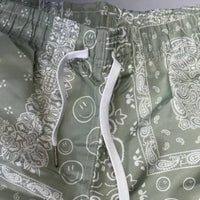 Bather Men's Paisley Lined Swim Trunks in green white - men's swimwear - detail view