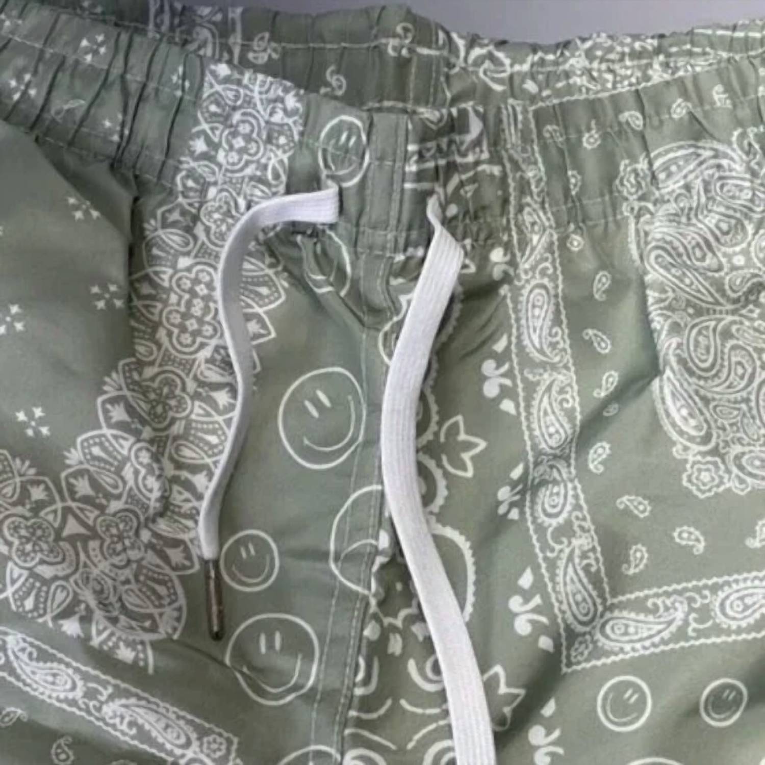 Bather Men's Paisley Lined Swim Trunks in green white - men's swimwear - detail view
