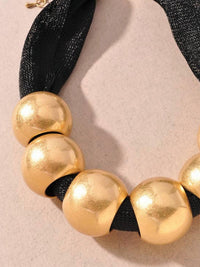 Merveille - Women's Gold Ball Mesh Statement Necklace