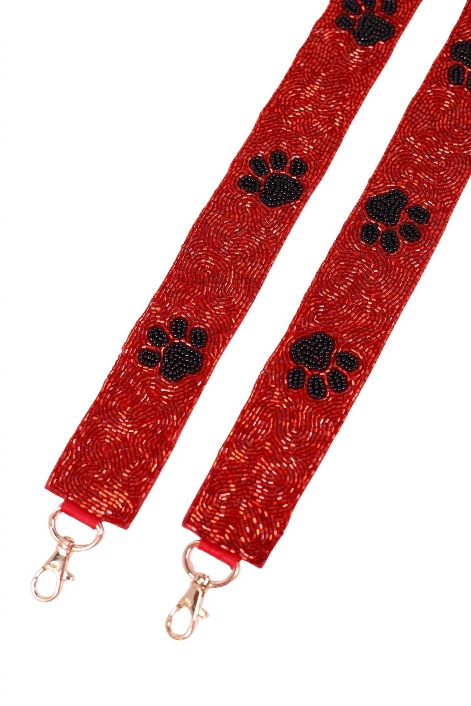 Caroline Hill Paw Print Crossbody Bag Strap in red - women's item