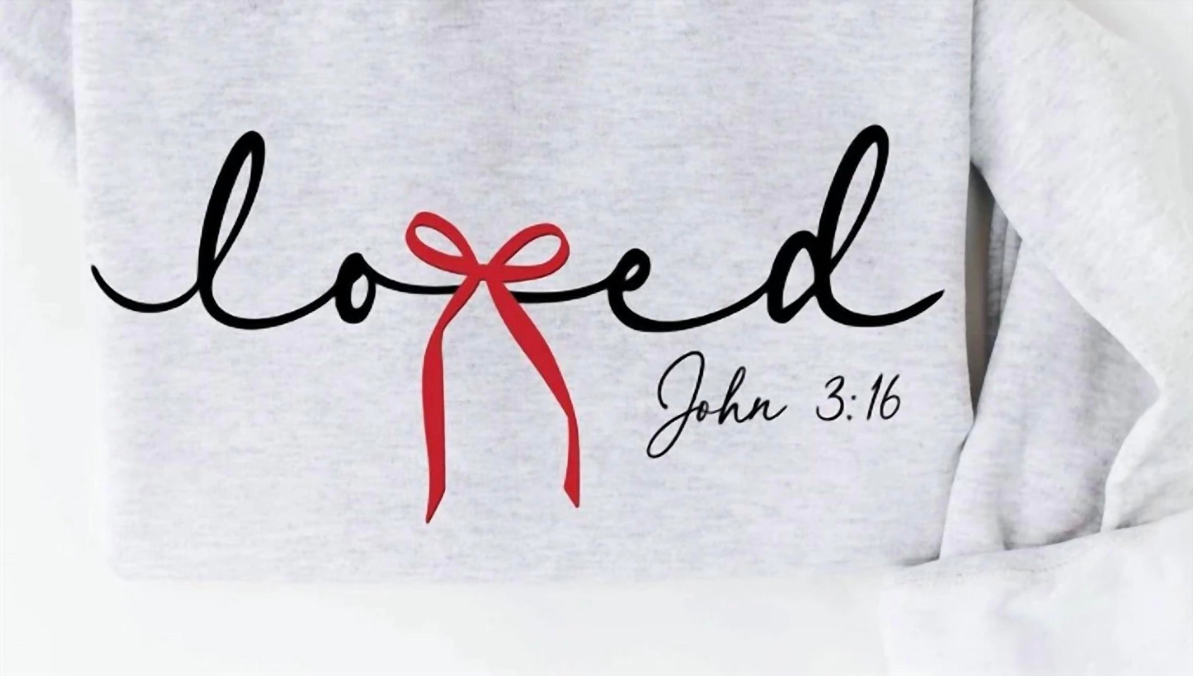 Oat Collective Women's Loved Bow John 3:16 Puff Graphic Sweatshirt in white heather - women's top - detail view