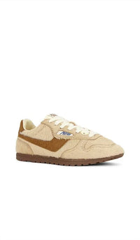 AUTRY Women's Windspin Sneaker in tan - women's sneaker - detail view