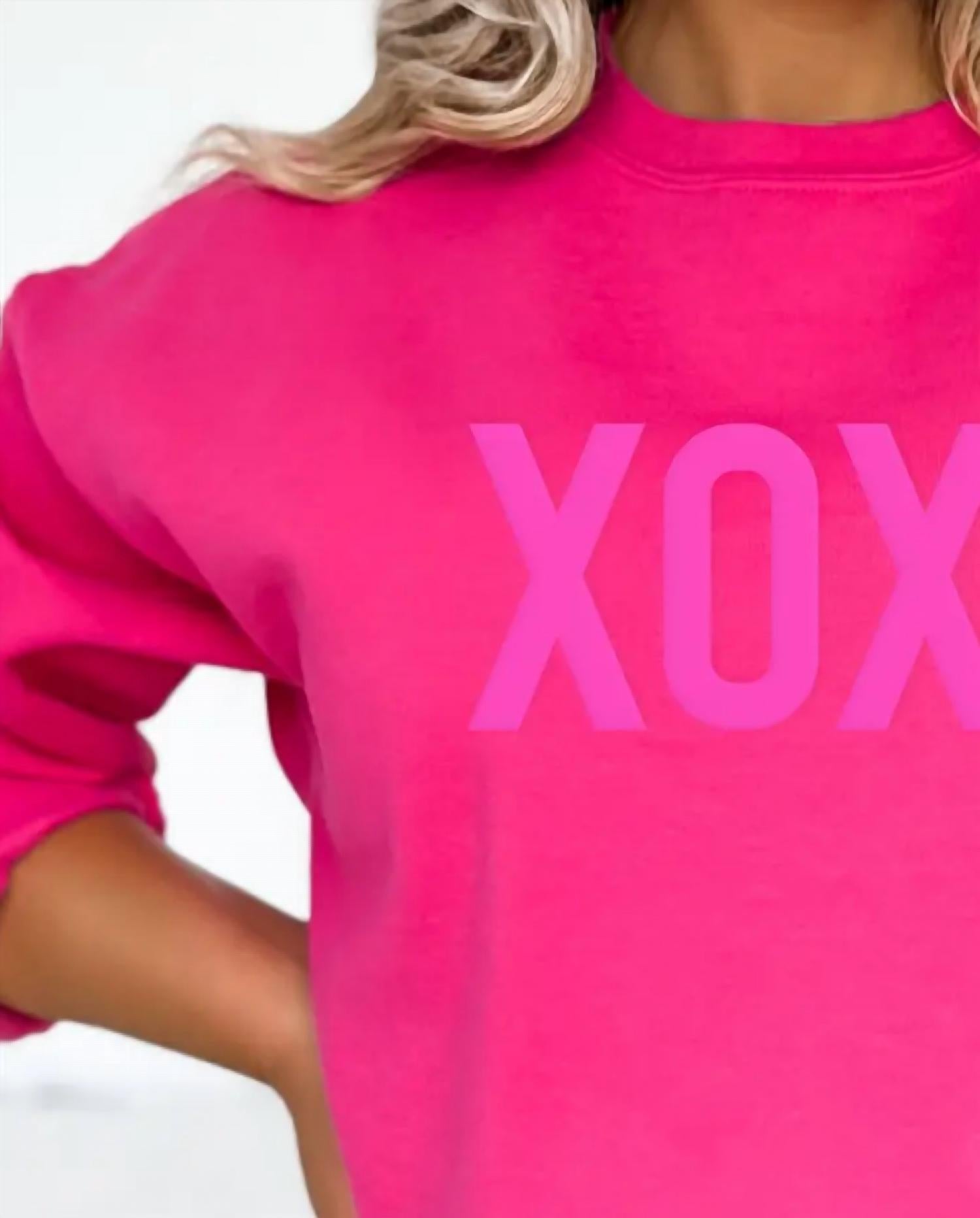 The White Invite Xoxo Embossed Sweatshirt in pink - women's top - detail view