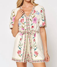 lalavon Floral Tie Waist Puff Sleeve Romper in off white pink multi - women's pants - detail view
