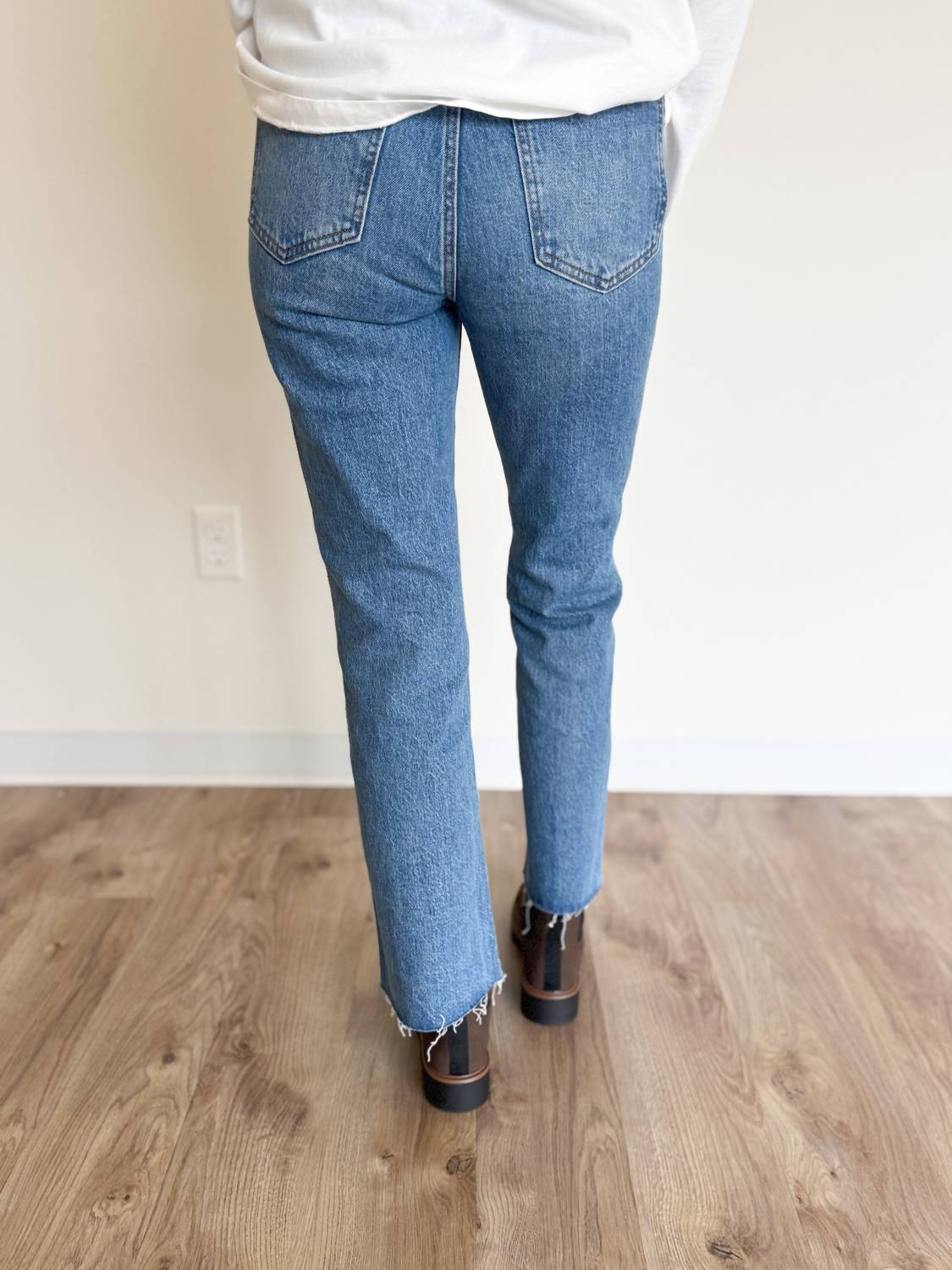 DAZE Kea Dark Raw Hem Crop Bell Jeans in blue - women's jeans - detail view