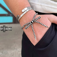 Rowdy Crowd Women's Bow Stretch Bracelet in silver beaded - women's jewelry - detail view