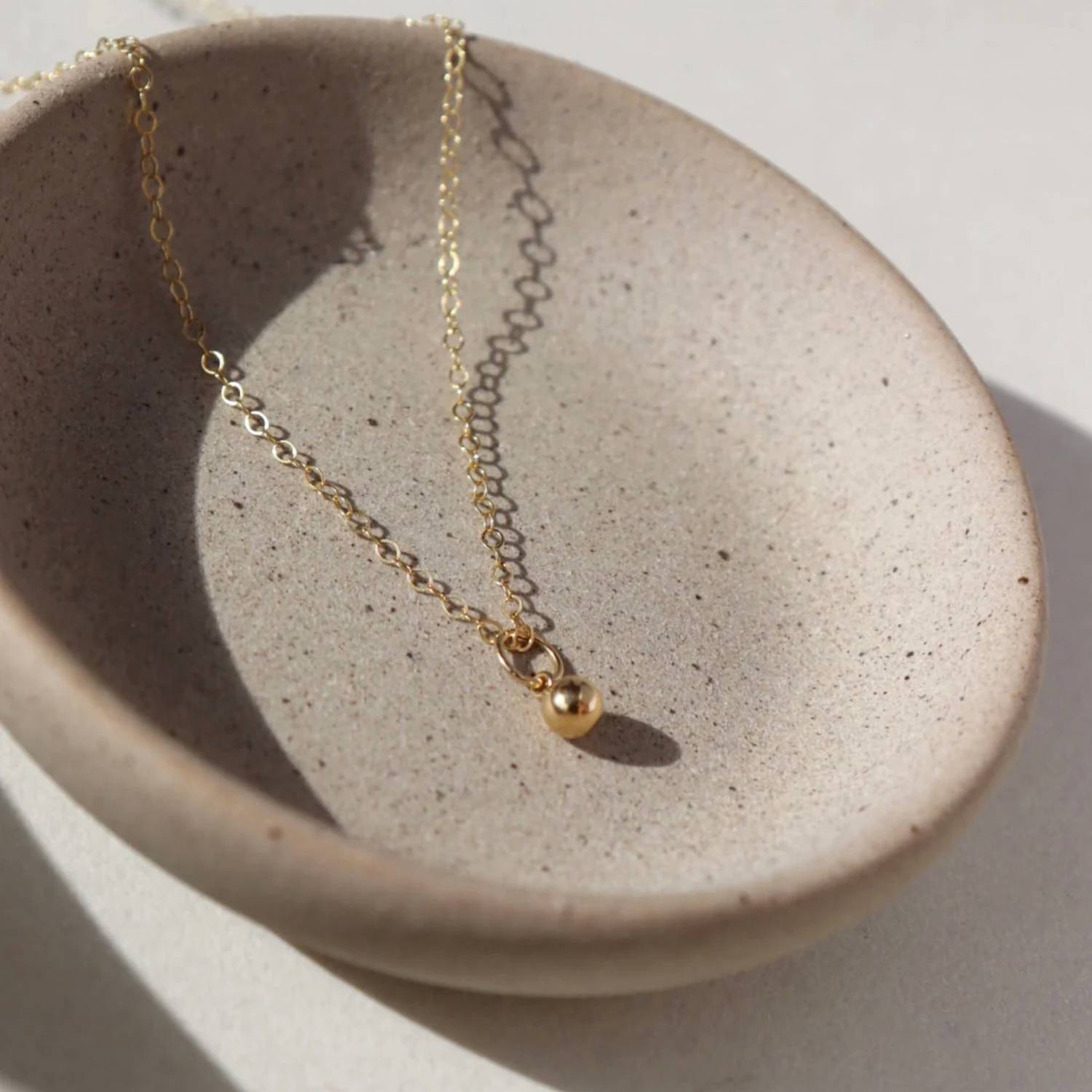 Token Jewelry - Golden Globe Necklace