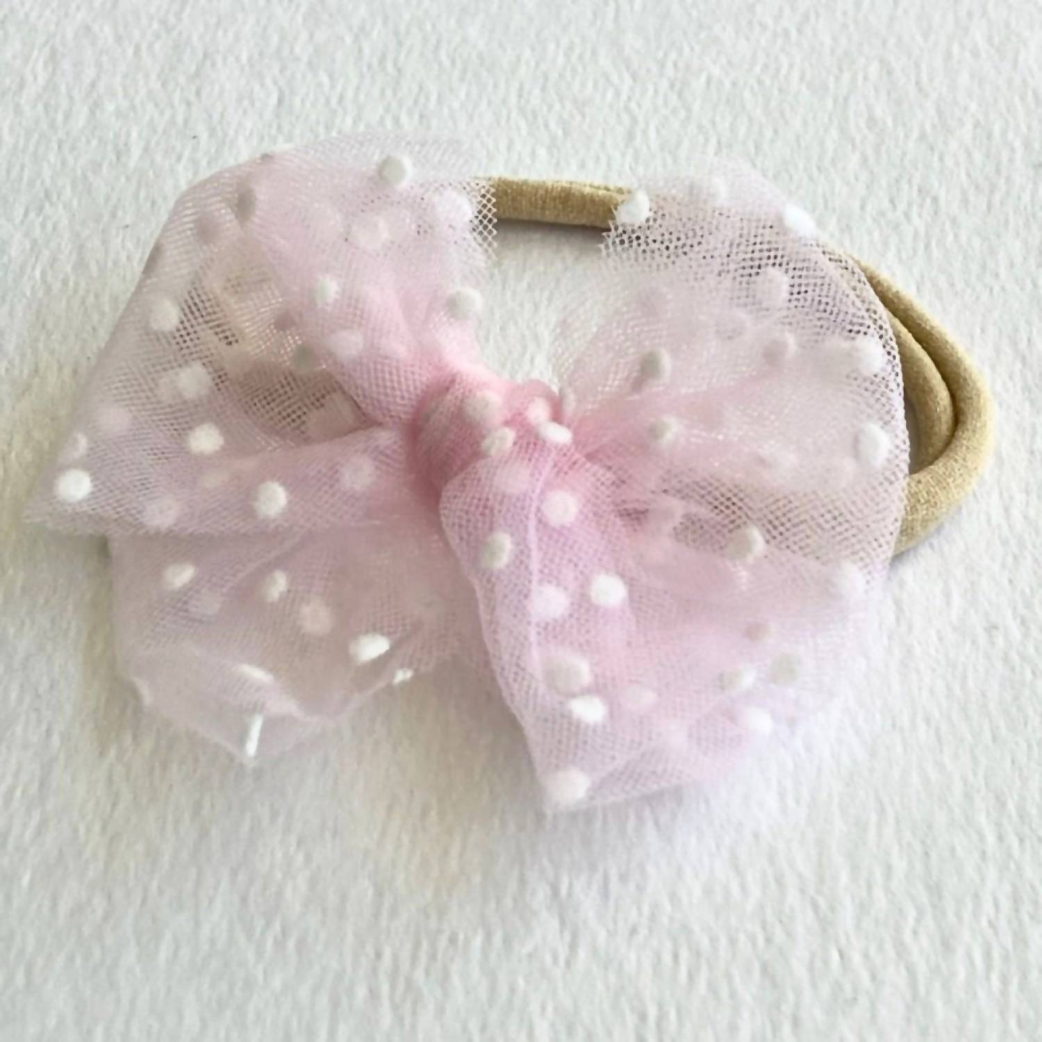 A Little Lacey Baby Bow Headband in pink - kids' accessory
