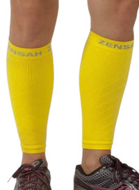 Zensah Compression Leg Sleeves in neon yellow - women's accessory - detail view