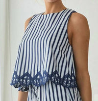 Skies Are Blue - Sleeveless Striped Top With Embroidery Hem