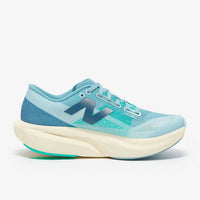 New Balance Women's Fuelcell Rebel V4 Running Shoe in quarry blue chrome blue - women's shoe