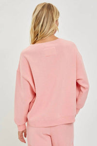 RISEN Oversized Step-hem Sweatshirt in blush - women's top - detail view
